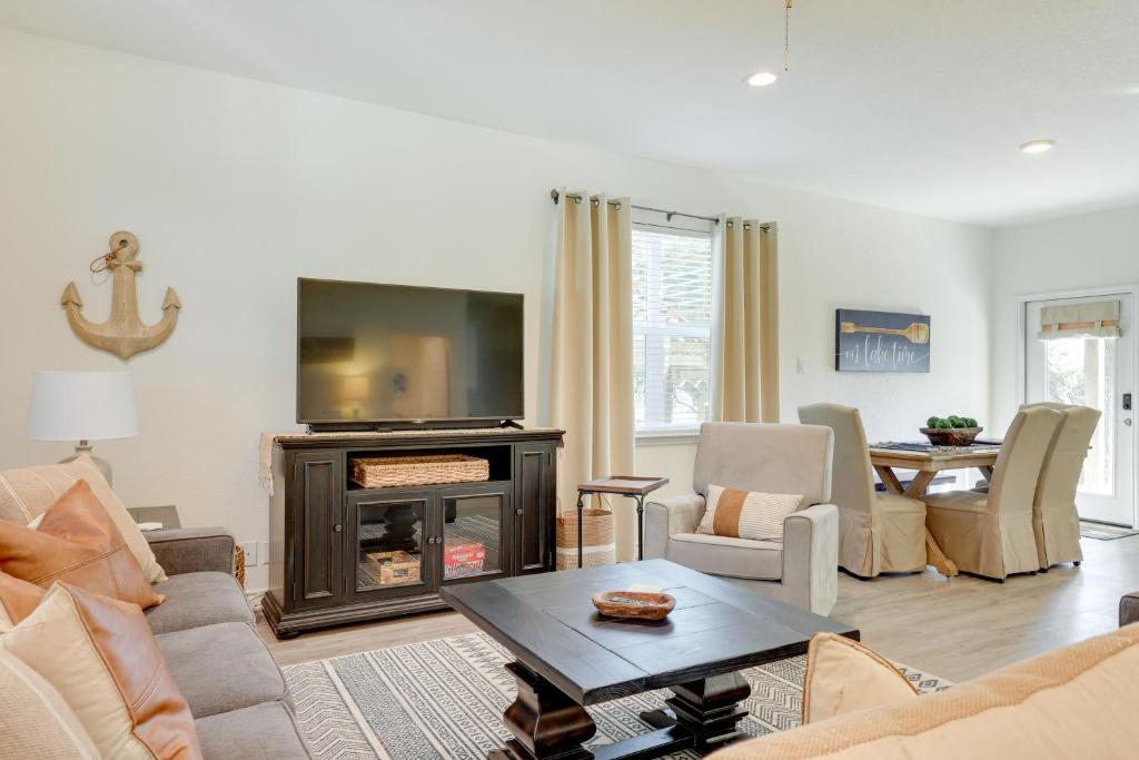 a living room with a couch and a fireplace at Canyon Lake Home Rental Boating, Patio and More! in Canyon Lake
