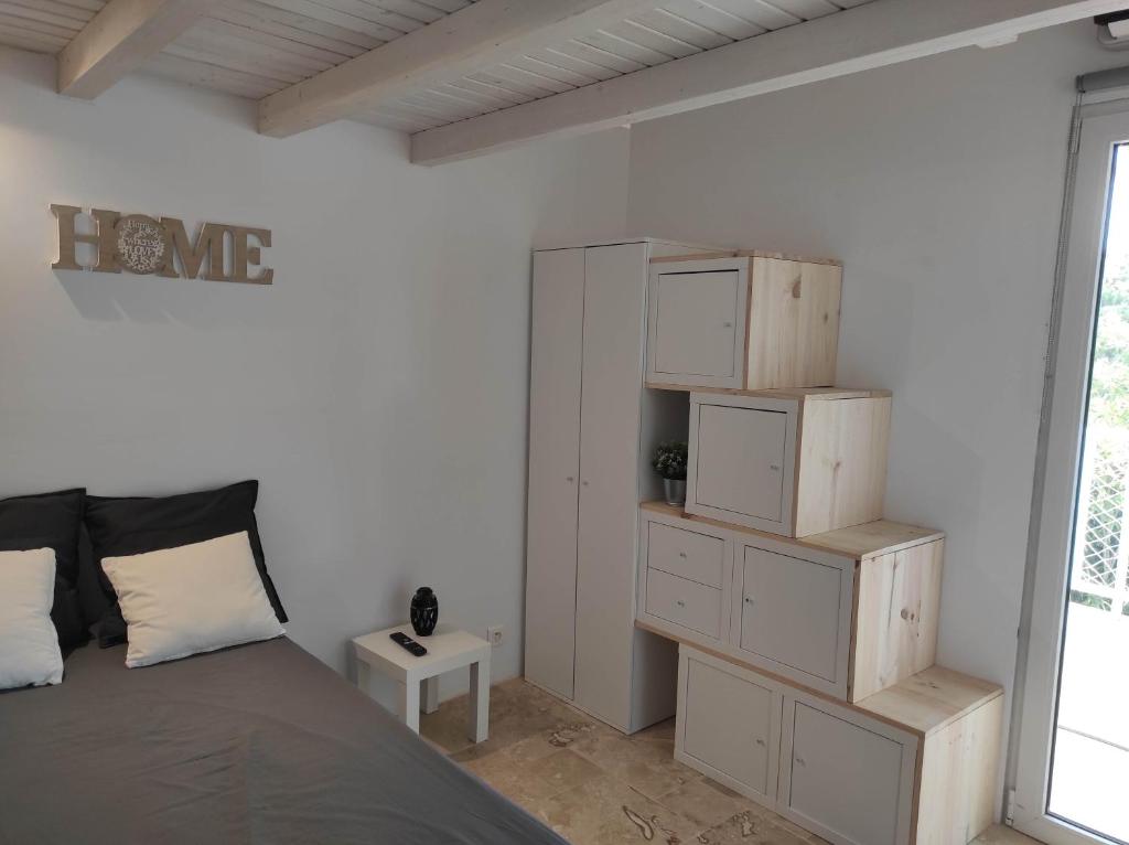 Łóżko lub łóżka w pokoju w obiekcie Chalet 60m² entièrement climatisé
