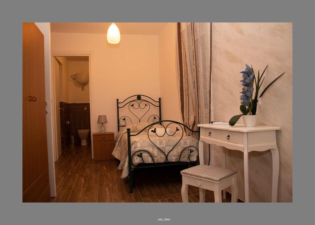 Postel nebo postele na pokoji v ubytování B&B Pastello