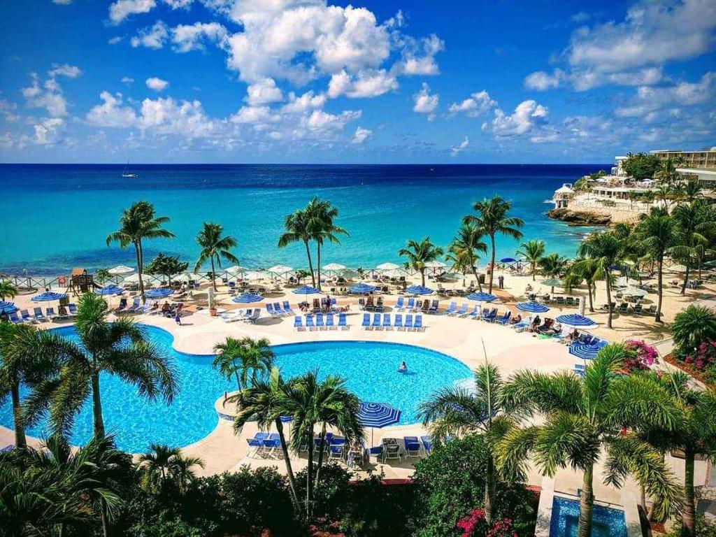 a view of the pool at the excellence punta cana resort at Royal Islander Club Resort La Plage in Lowlands