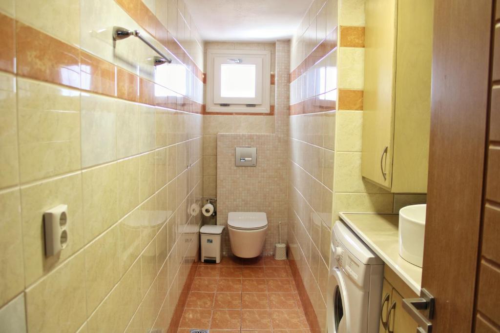 Koupelna v ubytování MAXIM APARTMENT