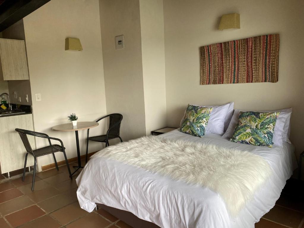 Postel nebo postele na pokoji v ubytování Ecolodge Bahia del Peñón