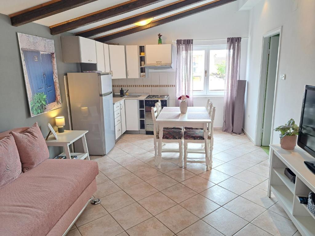 Kuchyň nebo kuchyňský kout v ubytování Apartments Nicole