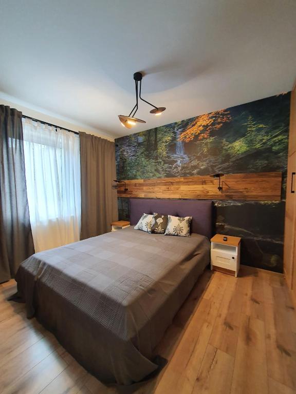 Postel nebo postele na pokoji v ubytování Apartamenty Stara Wisła