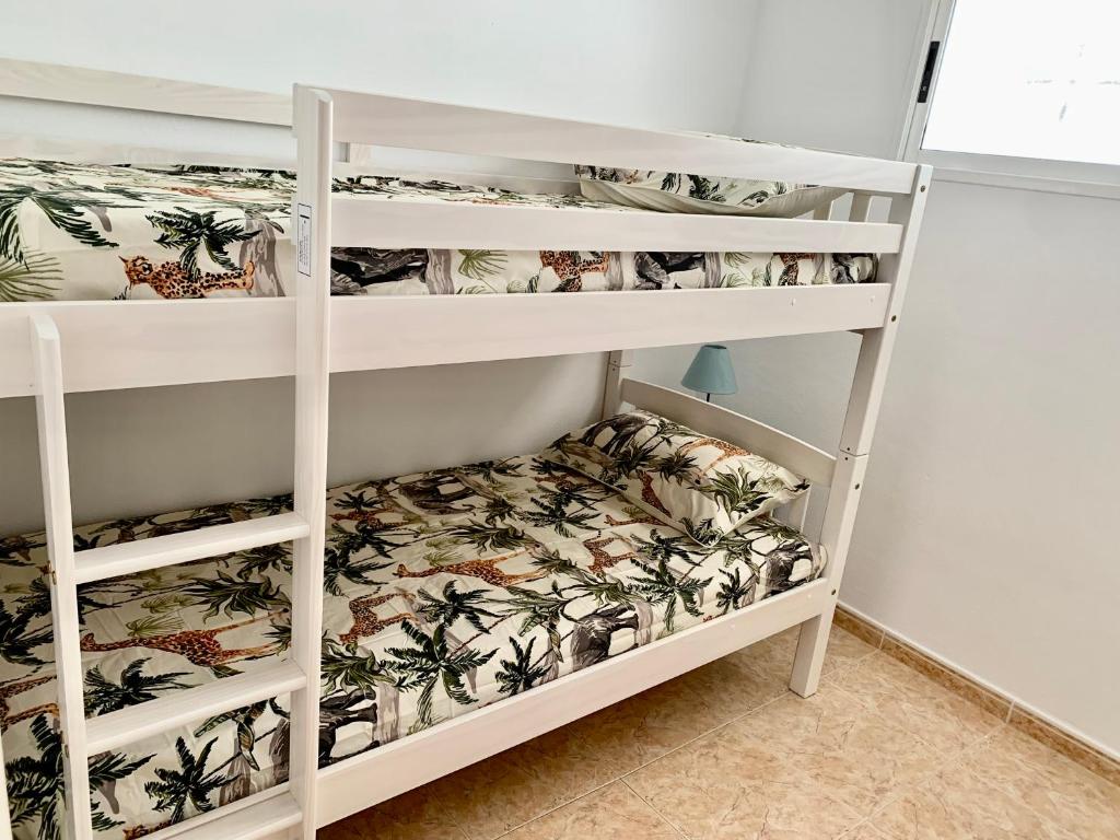 Posteľ alebo postele v izbe v ubytovaní SAN LUIS