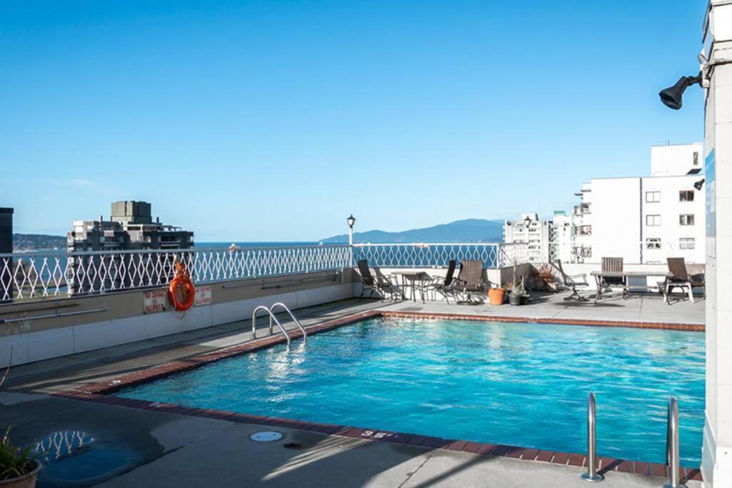 a swimming pool on the roof of a building at Ocean view in Vancouver