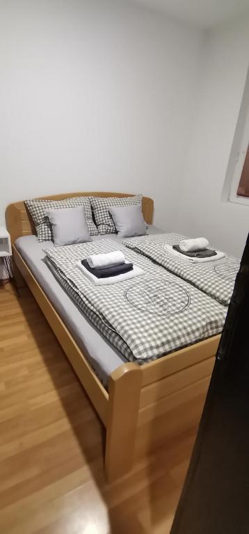 Postel nebo postele na pokoji v ubytování Apartman MAŠA