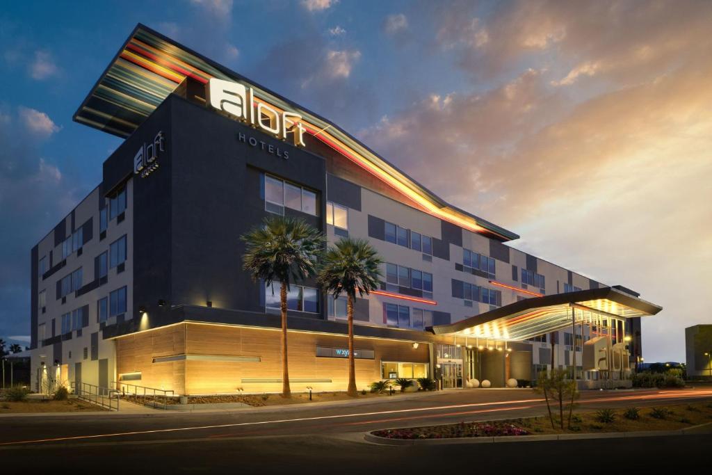 a hotel with a sign on the side of it at Aloft Henderson in Las Vegas