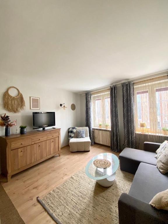Posteľ alebo postele v izbe v ubytovaní Apartament Starogdański 4