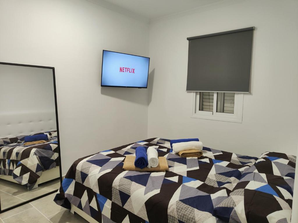 Postel nebo postele na pokoji v ubytování villa bonita