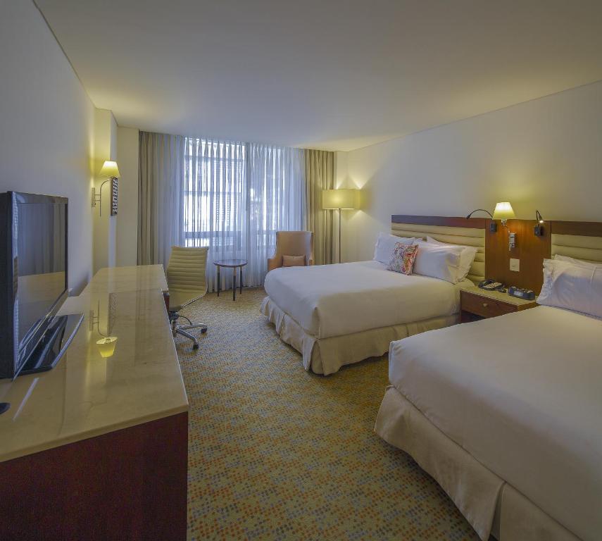 Postel nebo postele na pokoji v ubytování Hotel Chico 97