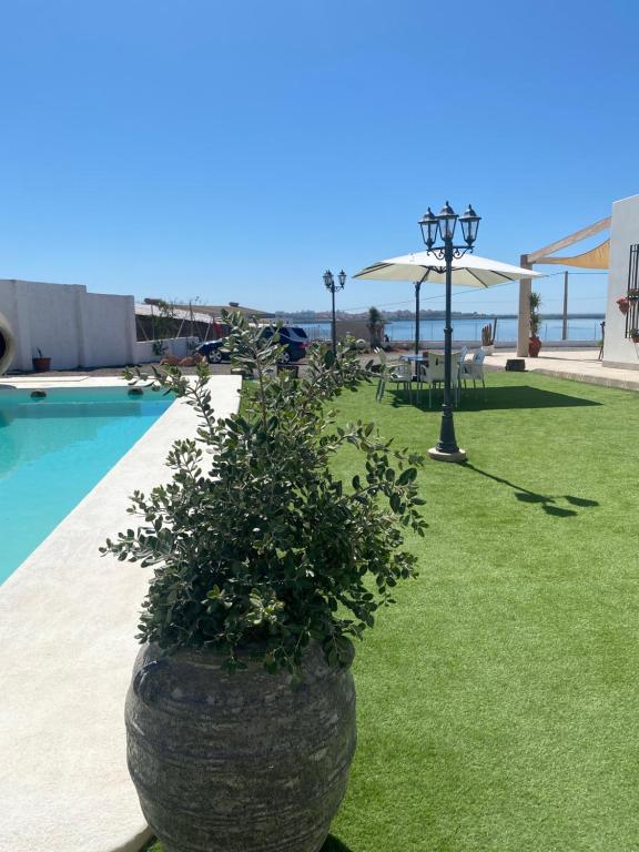 Bazén v ubytovaní Mi Cortijo hotel de playa alebo v jeho blízkosti