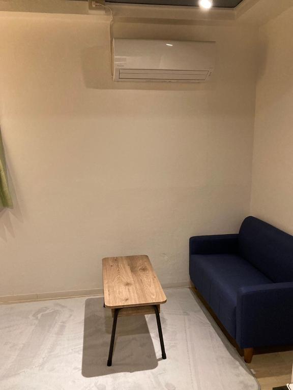 Posezení v ubytování Cloud Sharing Hotel Hakata 1 Guesthouse Dormitory