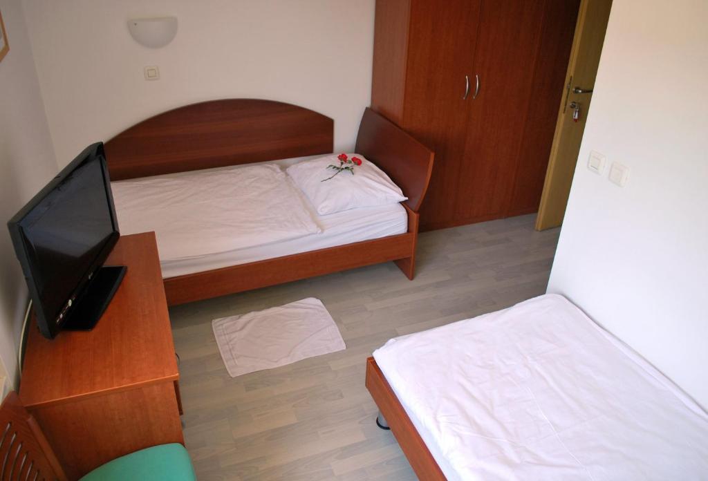 Postel nebo postele na pokoji v ubytování Bed and Breakfast Kogoj