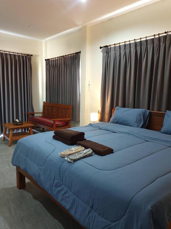 Postel nebo postele na pokoji v ubytování BSK Bungalows