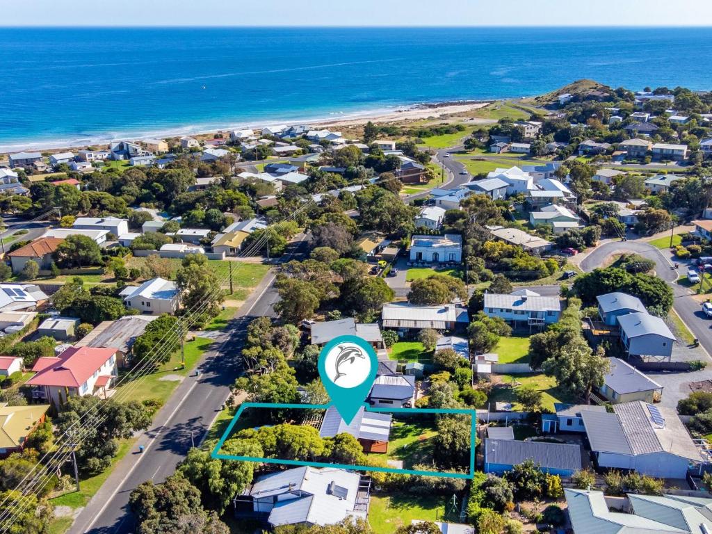 an aerial view of a suburb with a green marker at 17 Broadbeach Drive in Normanville