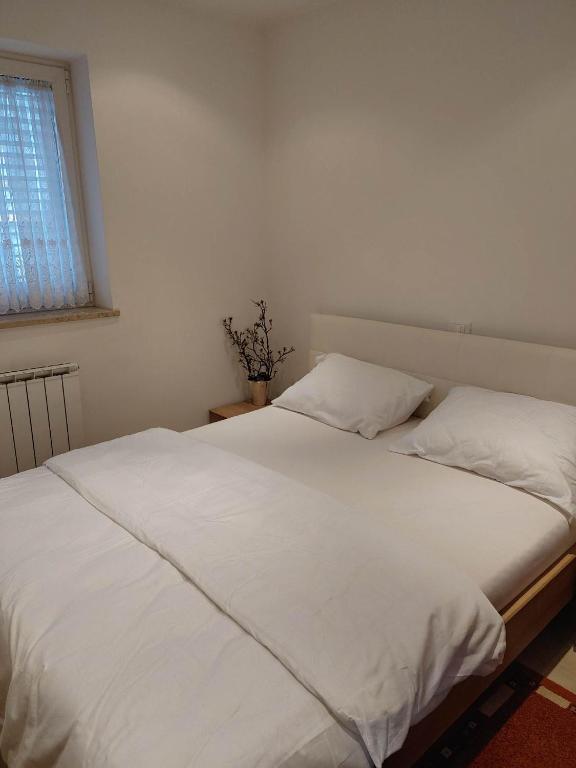 Postel nebo postele na pokoji v ubytování Papillon- free parking