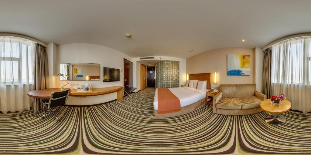 Postel nebo postele na pokoji v ubytování Holiday Inn Express Shanghai Jinqiao Central by IHG