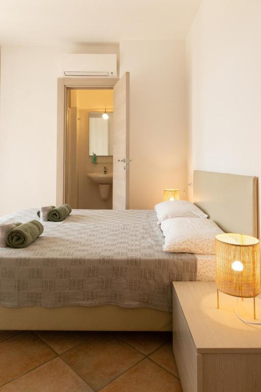 Postel nebo postele na pokoji v ubytování MARIS Apartments & Bedrooms