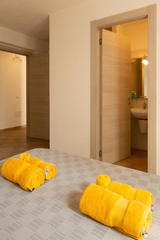 Postel nebo postele na pokoji v ubytování MARIS Apartments & Bedrooms
