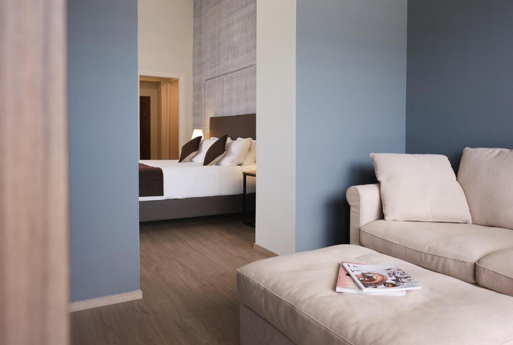 Postel nebo postele na pokoji v ubytování Hotel Ghiffa