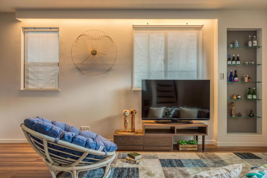 TV a/nebo společenská místnost v ubytování 92sqm misa,House,Ueno sky tree area, free wifi 3LDK