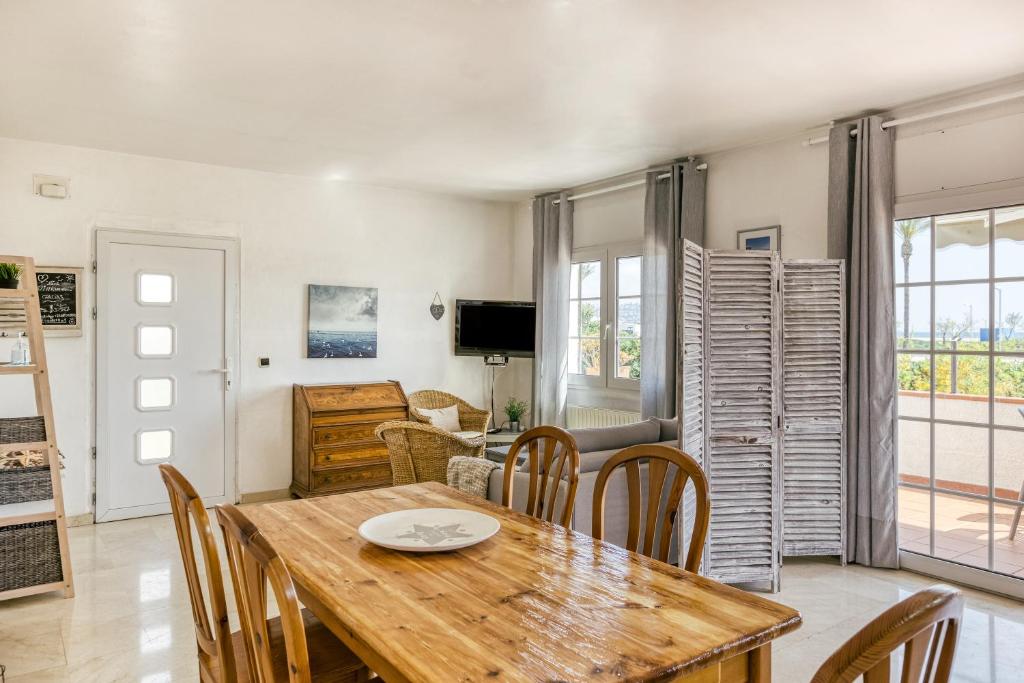 Televízia a/alebo spoločenská miestnosť v ubytovaní Art- Apartamentos Revilla Tacke A