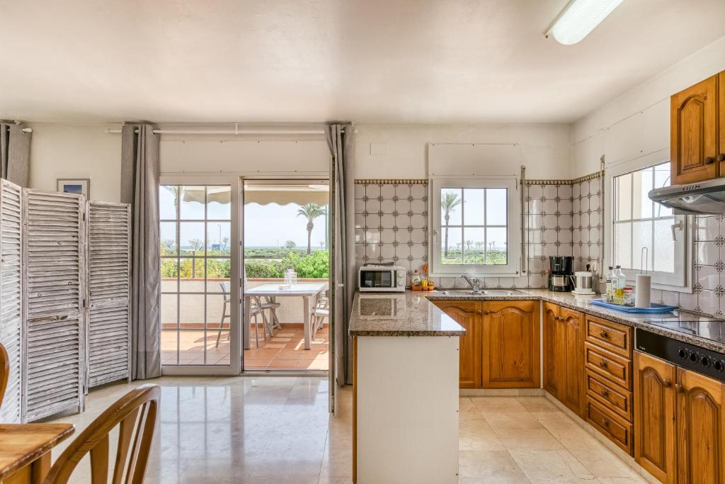 Kuchyňa alebo kuchynka v ubytovaní Art- Apartamentos Revilla Tacke A