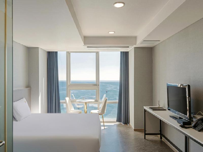 TV a/nebo společenská místnost v ubytování Sun Cloud Hotel