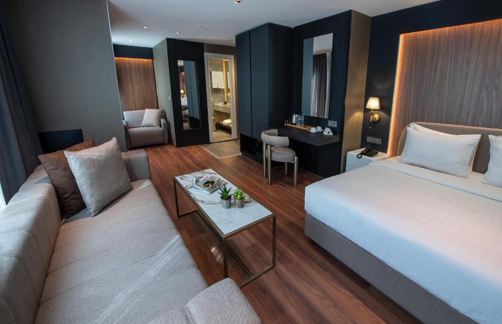 Postel nebo postele na pokoji v ubytování Hotel Bosfora
