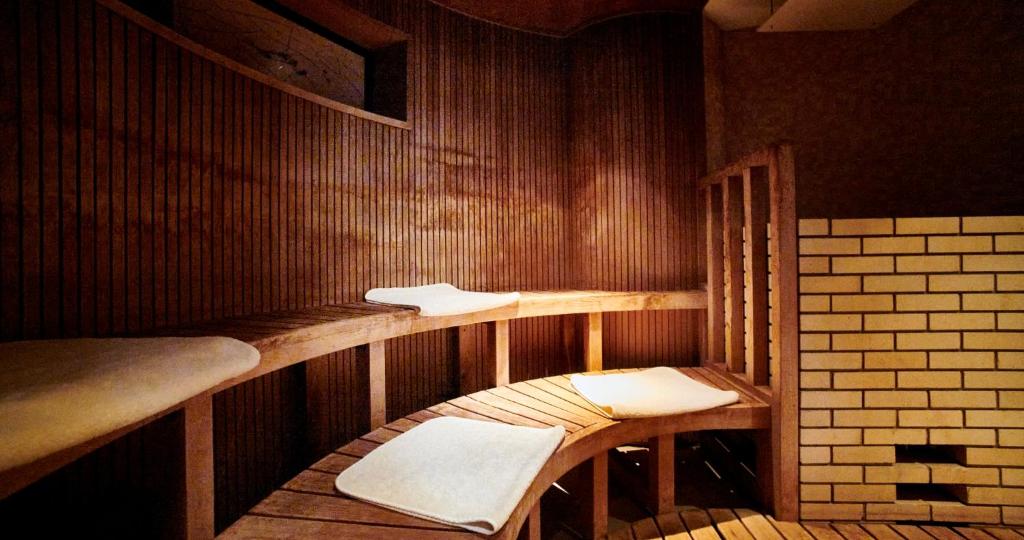 Postel nebo postele na pokoji v ubytování Enoshima Hotel ーEnoshima Island Spa Hotel Buildingー