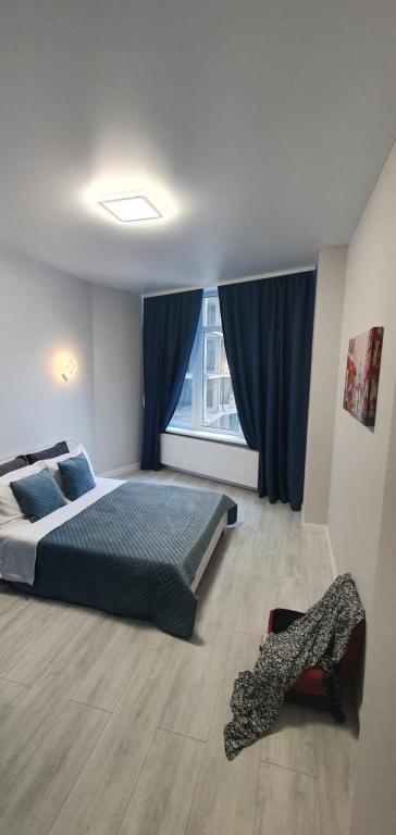 Postel nebo postele na pokoji v ubytování Apartments SmartHause