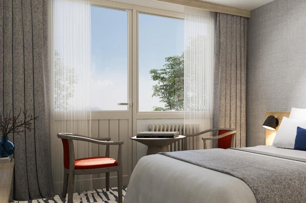 a hotel room with a bed and a window at Erzurumlu Hotel in Kilyos