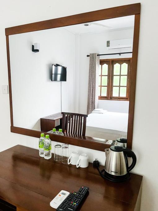 Postel nebo postele na pokoji v ubytování Ravan Resort Tangalle