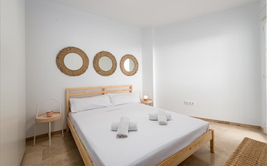 Postel nebo postele na pokoji v ubytování Small Oasis