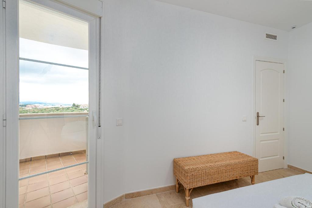 Postel nebo postele na pokoji v ubytování Small Oasis