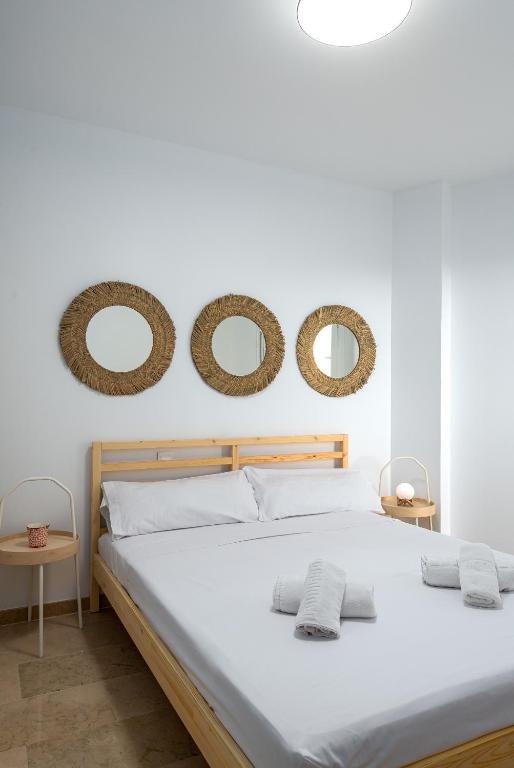 Postel nebo postele na pokoji v ubytování Small Oasis