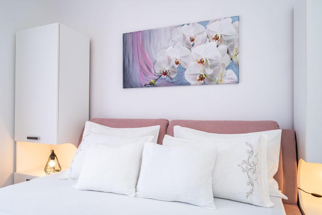 Posteľ alebo postele v izbe v ubytovaní Apartment & Rooms Duja