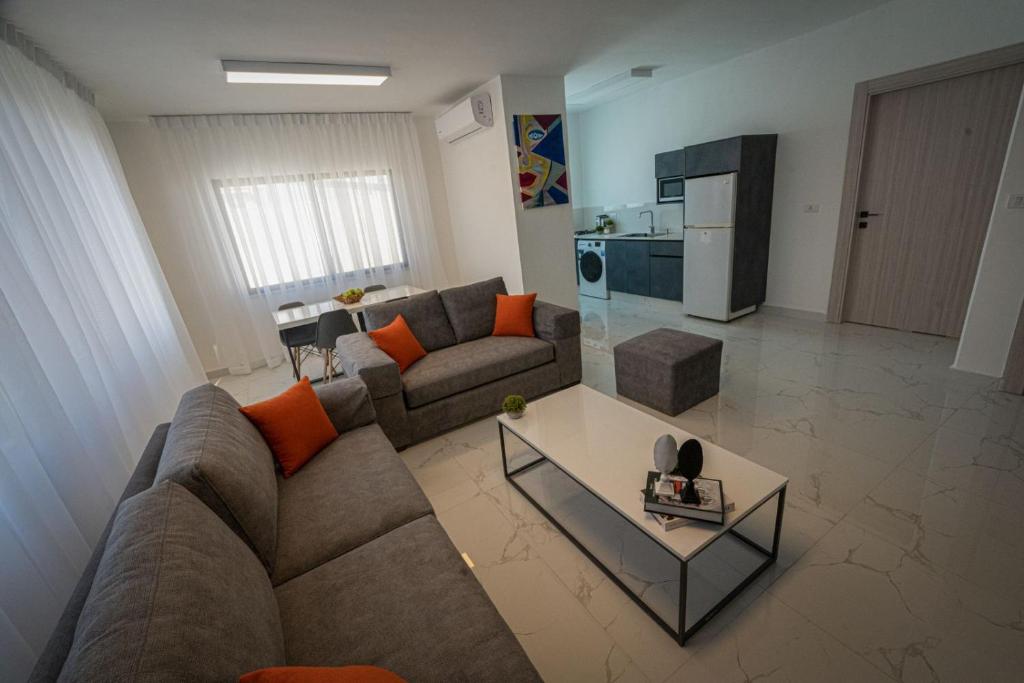 Posezení v ubytování Al Kawther Hotel Apartments