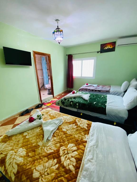 Postel nebo postele na pokoji v ubytování Motel Ain Mersa