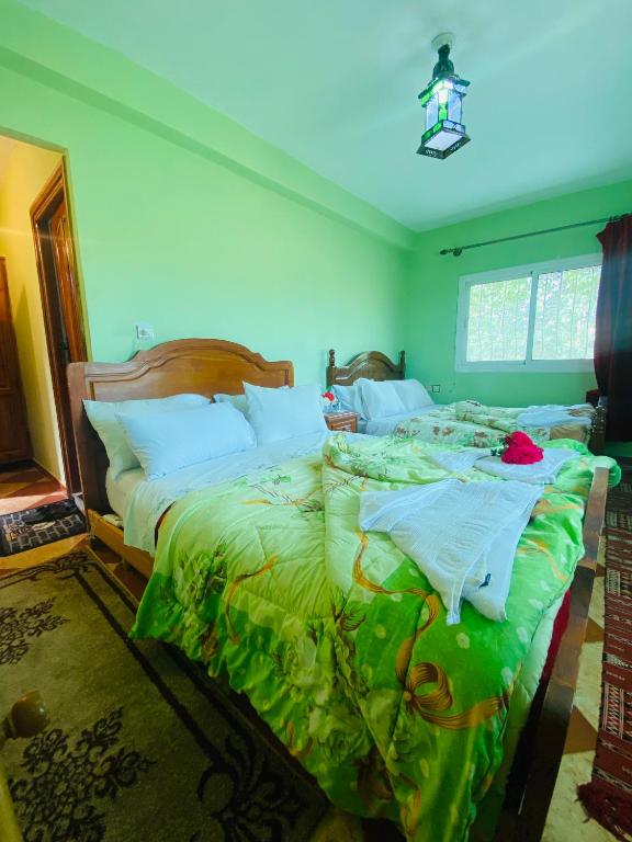 Postel nebo postele na pokoji v ubytování Motel Ain Mersa