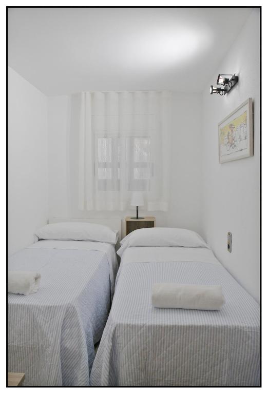 Posteľ alebo postele v izbe v ubytovaní APARTAMENTO CENTRICO JUNTO AL MAR - WIFI FREE