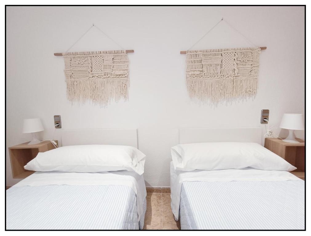 Posteľ alebo postele v izbe v ubytovaní APARTAMENTO CENTRICO JUNTO AL MAR - WIFI FREE