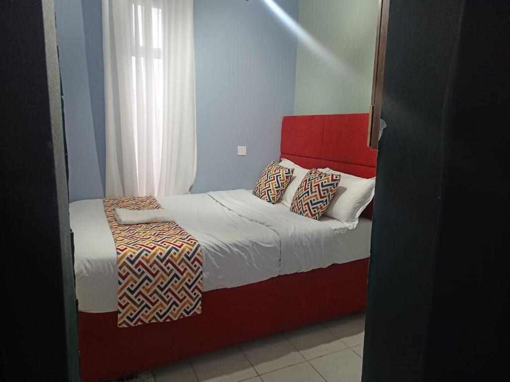 Katil atau katil-katil dalam bilik di Benhope Luxury Homes Racecourse gardens