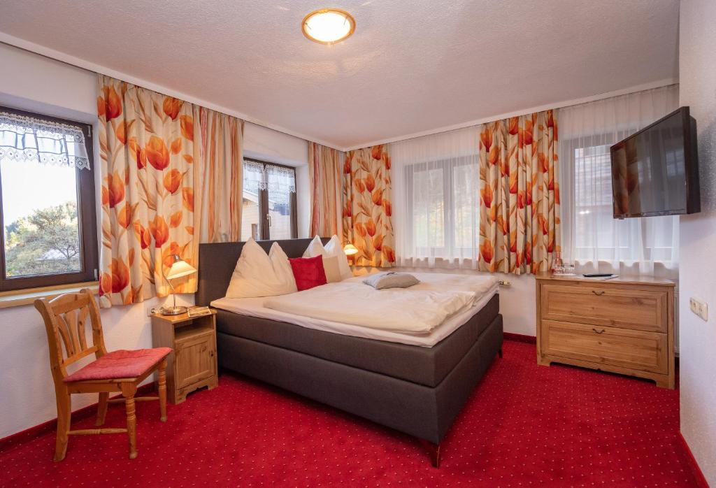 Postel nebo postele na pokoji v ubytování B&B by Zillners