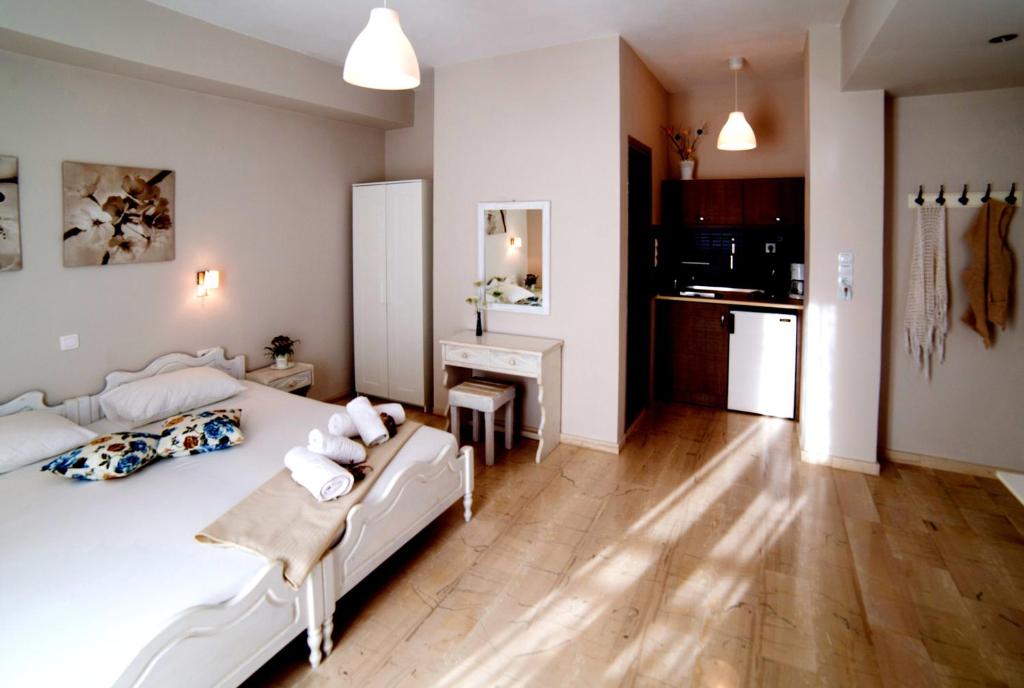 Posteľ alebo postele v izbe v ubytovaní Calma Apartments & Studios