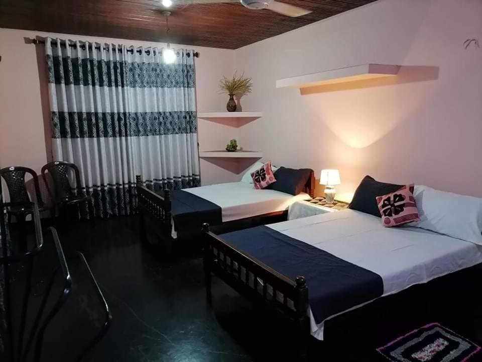 Postel nebo postele na pokoji v ubytování Kingsland Hostel