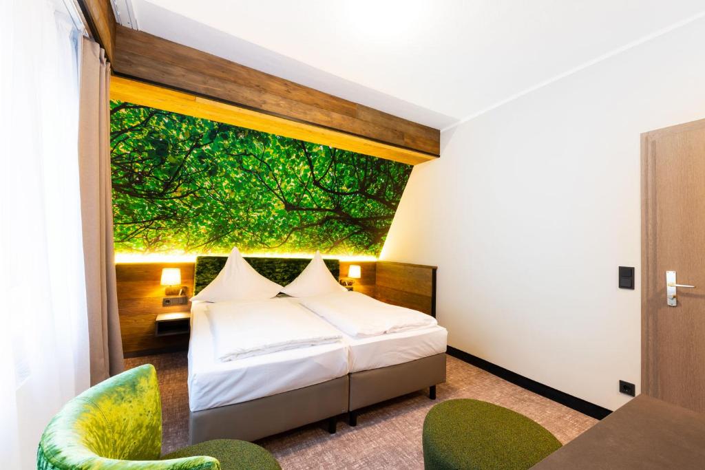 Letto o letti in una camera di Hotel Waldmühle