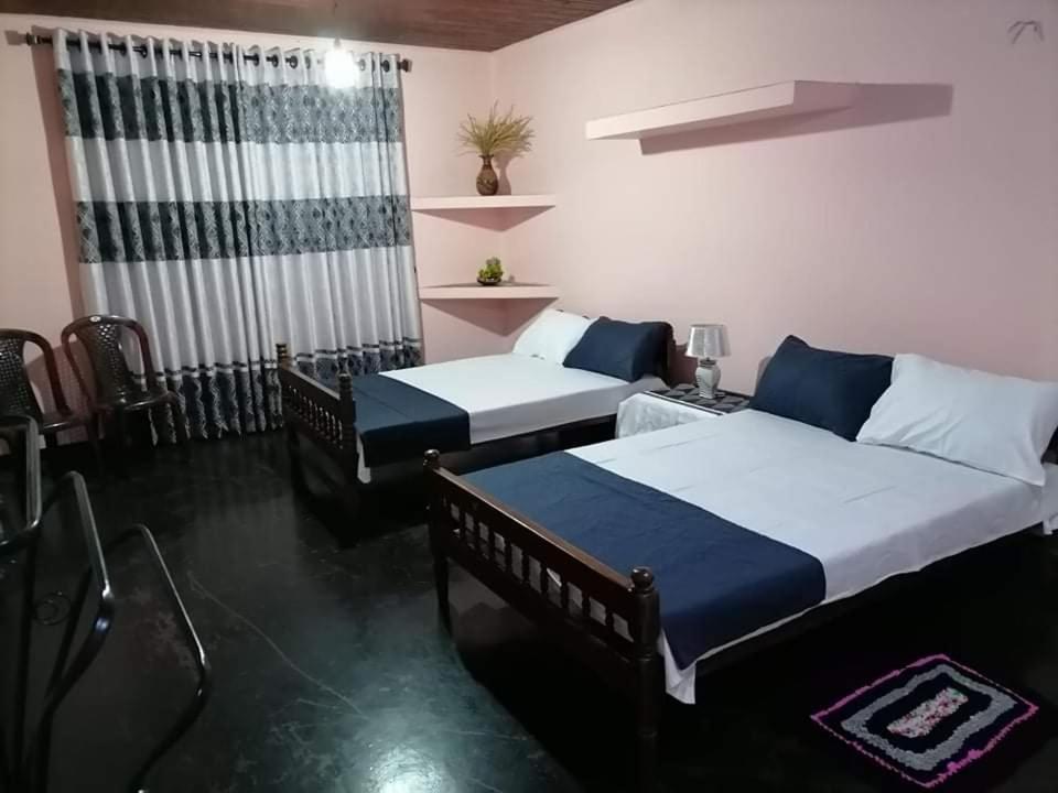Postel nebo postele na pokoji v ubytování Kingsland Hostel