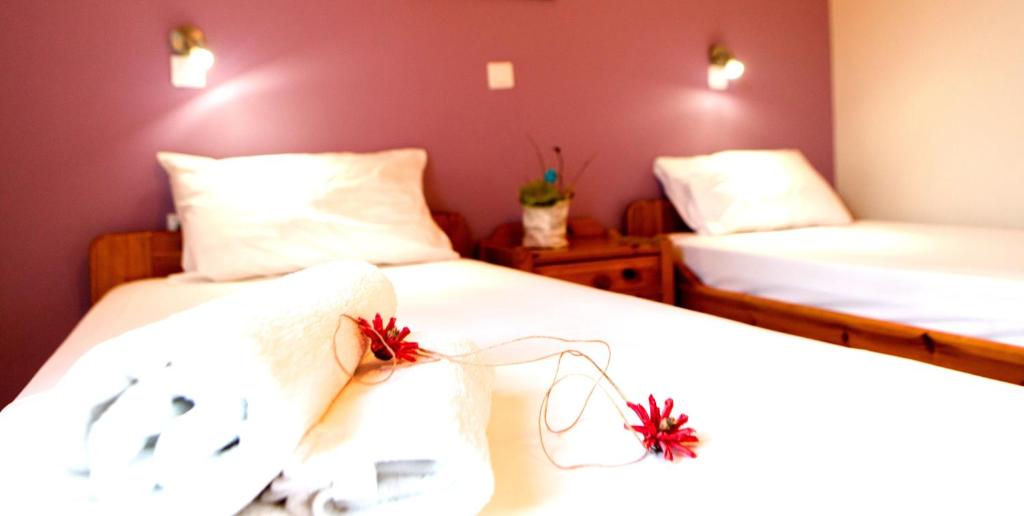 Posteľ alebo postele v izbe v ubytovaní Calma Apartments & Studios